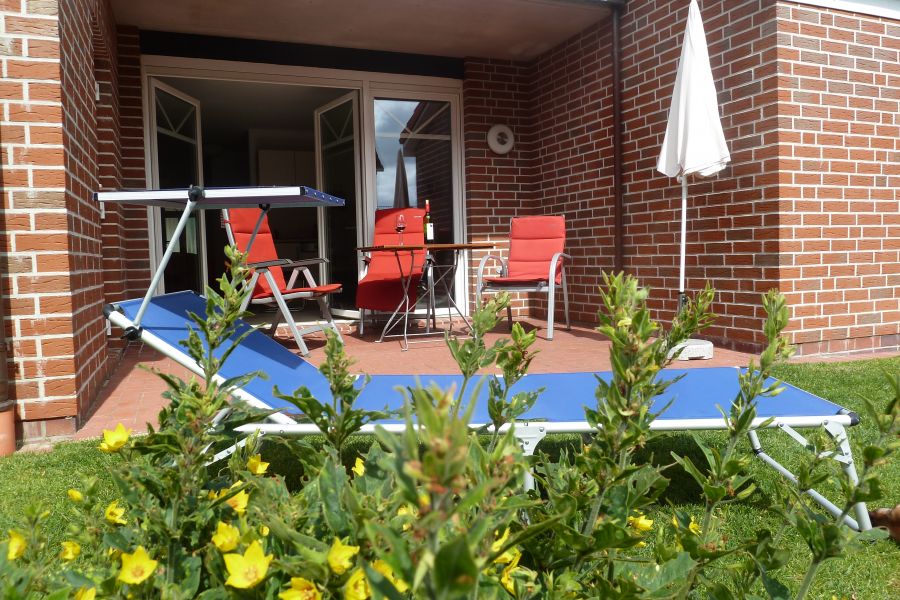 Terrasse mit eingezäuntem Garten